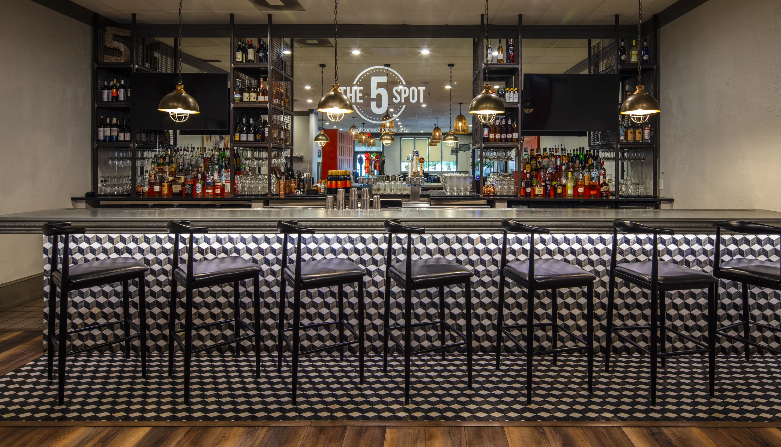 A cast zinc bar top by La Bastille at Five Spot